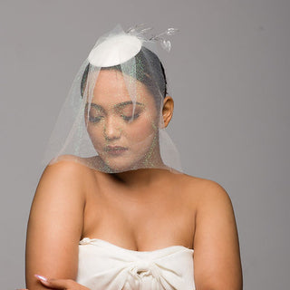 White veiled headpiece with translucent leaves