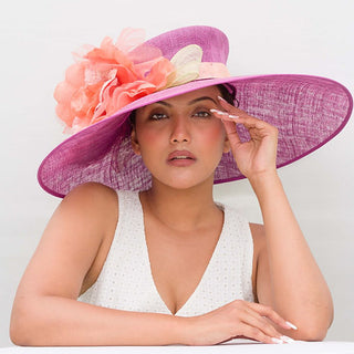 Rosy- purple hat with peach floral trims