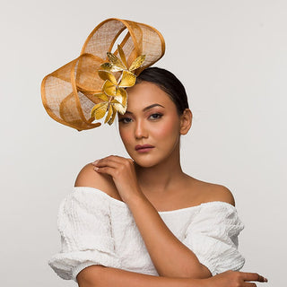 Nyx- gold fascinator with leather floral mount