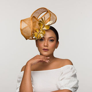 Nyx- gold fascinator with leather floral mount