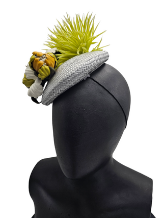 Daria- Mat silver versatile fascinator with lime flowers with leather