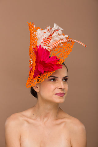 Calytrix-orange paper woven fascinator base with red feather flower and multi colored feathers