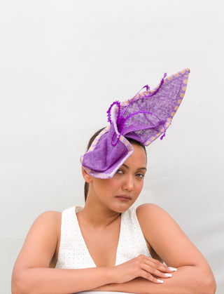 Phoenix- purple fascinator with crinkle cut feathers
