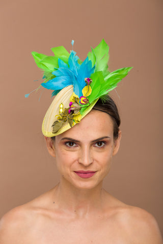 Dora- colorful green fascinator with leather motif