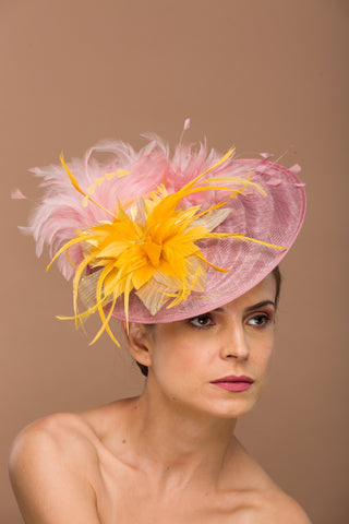 Lillian- pink fascinator with feathers and golden yellow flower