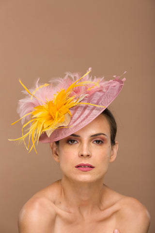 Lillian- pink fascinator with feathers and golden yellow flower