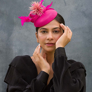 Fuschia fascinator with feather twirls and dusty pink biot feather flower