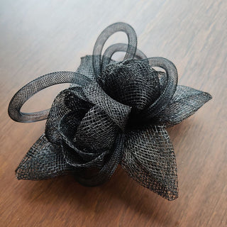 Kids black headwear fascinator with floral trims ideal for ages 2-5