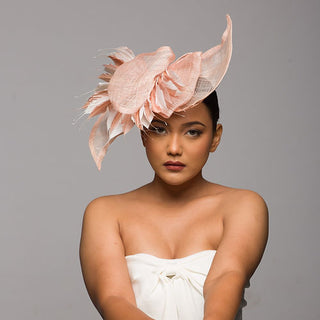 Neutral fascinator with pointy feathers