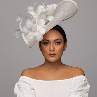 White and grey fascinator with feather flower