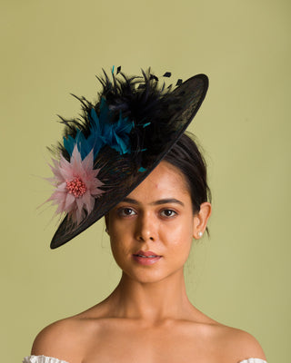 big derby hat with feathers
