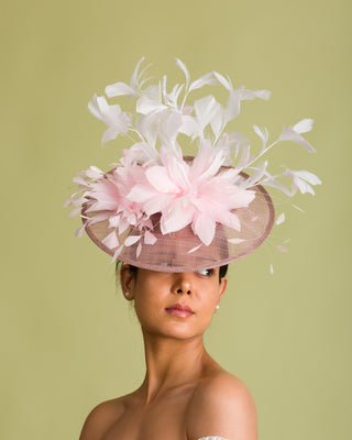 fascinator with pink pearl earings necklace