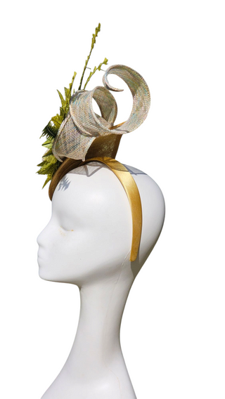 green fascinator on headband