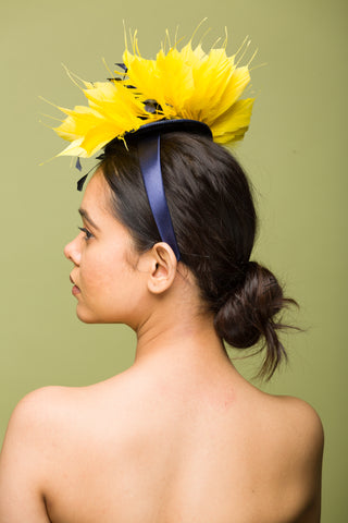 navy blue and yellow fascinator