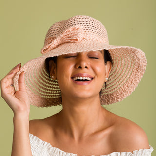 Peach Sun hat with a bow trim (Oona)